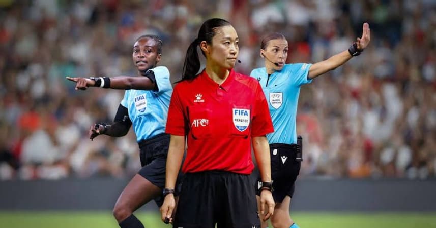 FIFA President stands with female referee who received death threats