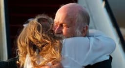 British couple freed by Taliban hug daughter in emotional reunion