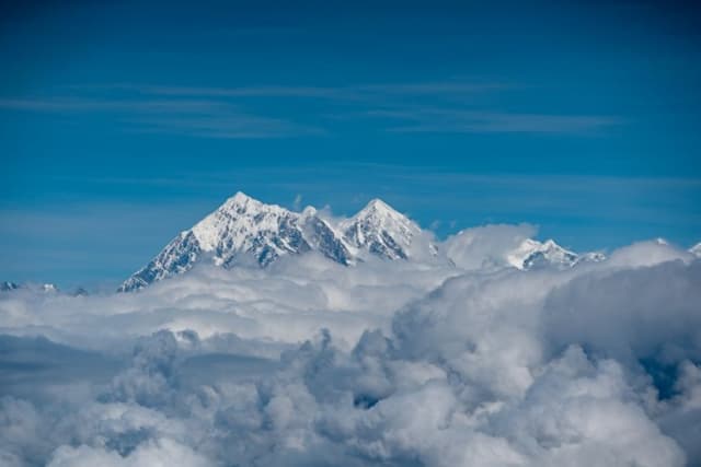 French national and Nepali guides among three killed in avalanche on Nepal mountain, other foreign climbers missing