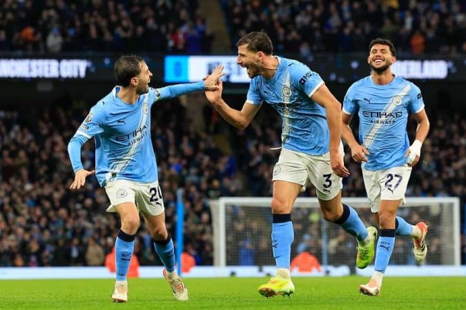 Man City win to move within two points of Arsenal