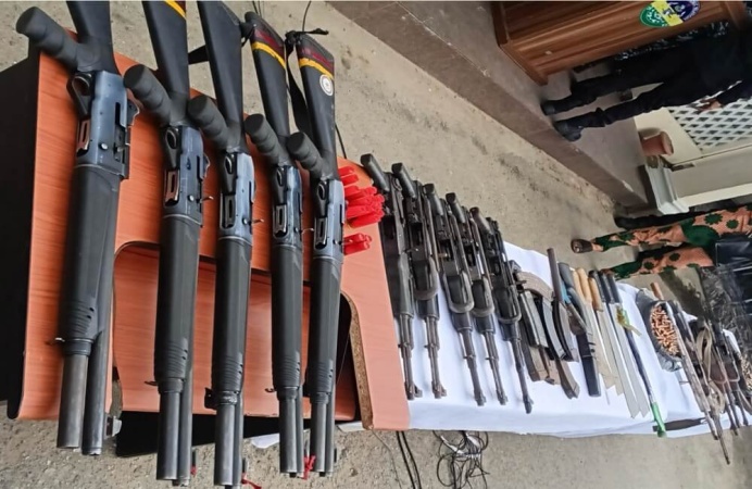 Police arrest nine suspected gun runners, arms couriers, recover AK-47 rifles, pistols