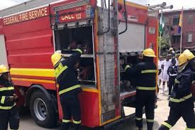 Lagos firefighters rescue knife-wielding man from well