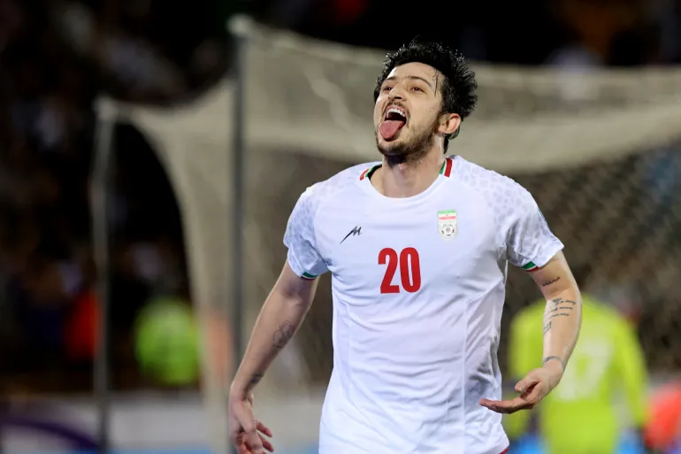 Iran footballer Azmoun kicked off national team for disloyalty, say reports