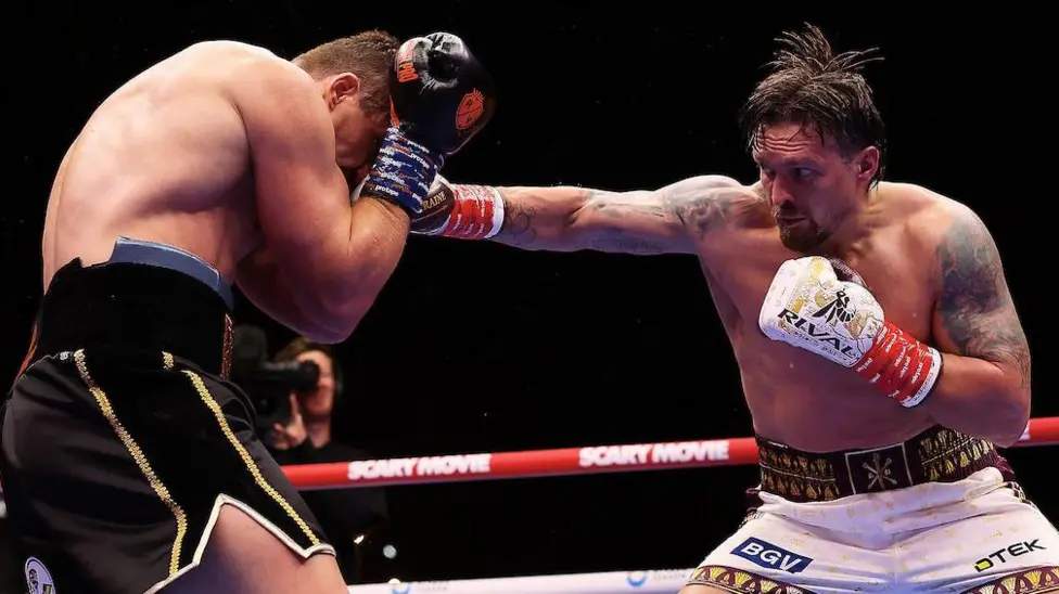 Usyk retains world heavyweight boxing titles with controversial Verhoeven stoppage