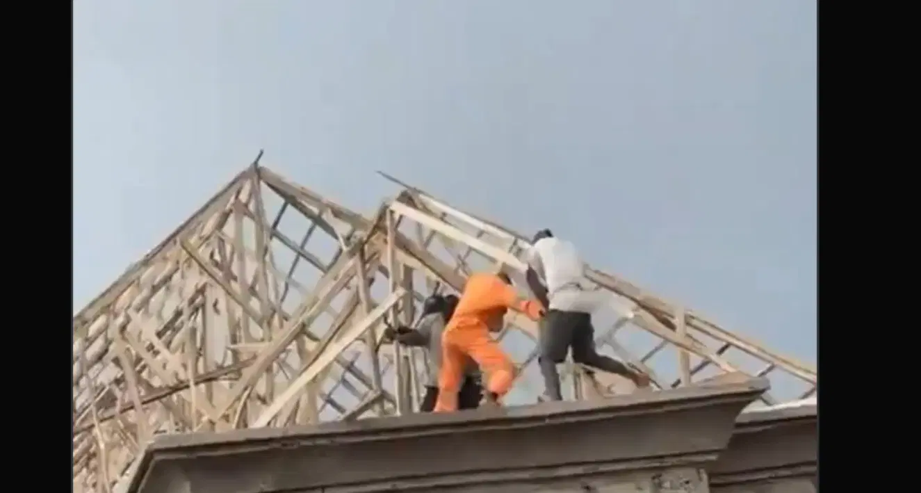 Two construction workers fall from rooftop during site fight, one feared dead