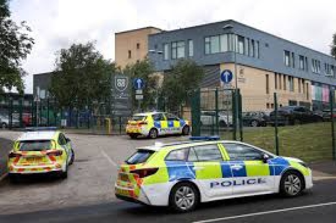 14-year-old girl arrested after knife attack at Manchester school, three injured